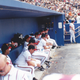 At right, first base coach Glenn Hubbard stares directly at me as I take a photo.